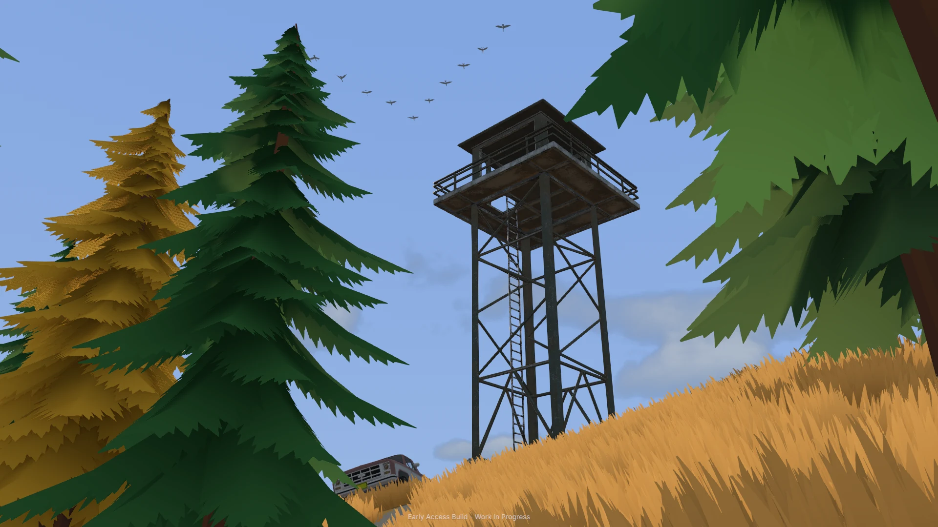 A wooden lookout tower rises above a grassy hillside and conifer forest.