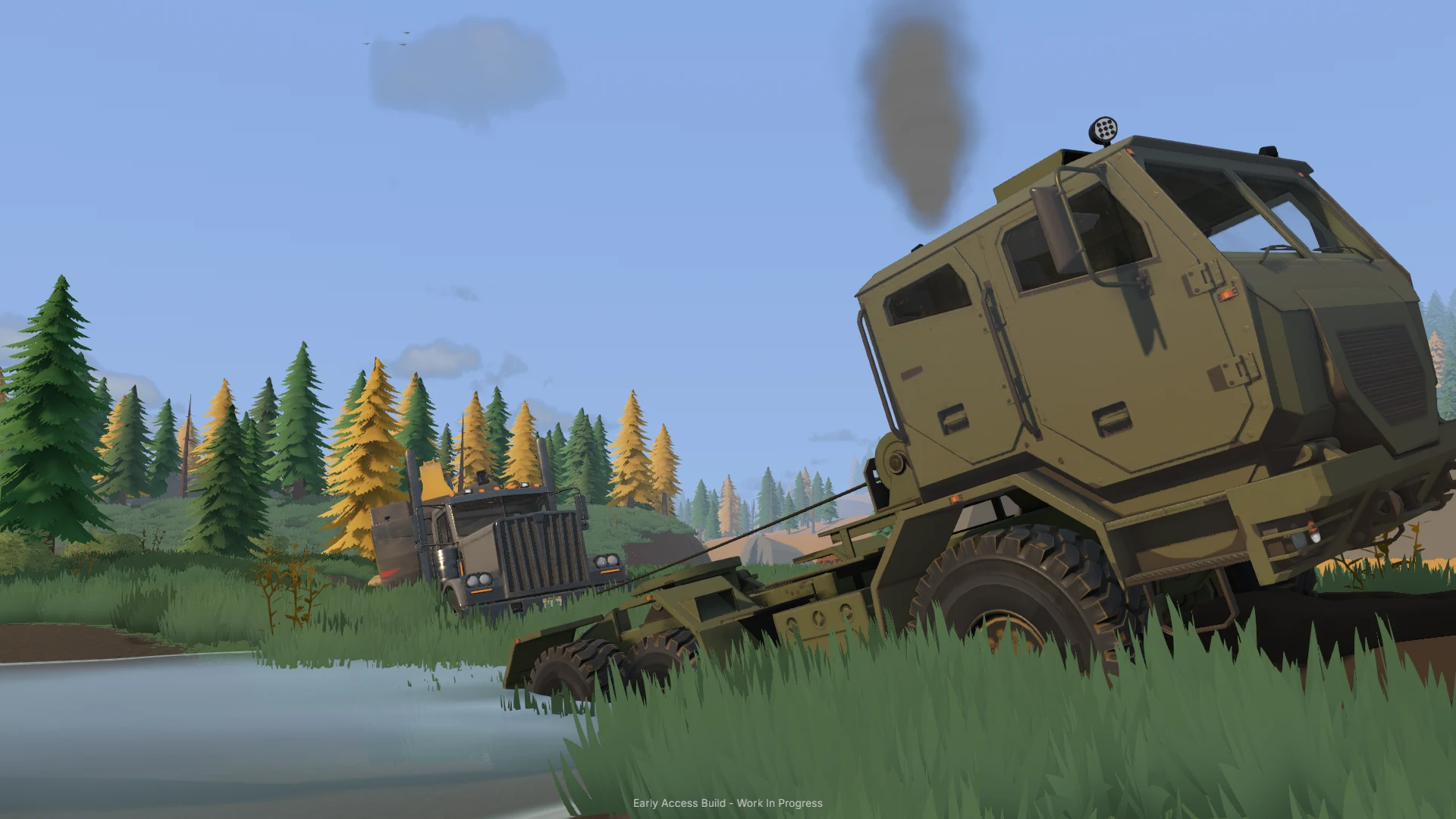 A heavy recovery truck hauls another vehicle through water beside a grassy bank